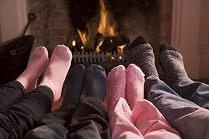 Family by the fireplace